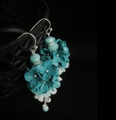 If you do not want or cannot pay using PayPal, select Other payment, and then follow this link https://checkout.seller-online.net/?morecolors Tender earrings with cute hand made flowers. This is a lovely earrings. Light teal mint ombre flowers and crystal beads. Long, unique eye catching design of jewelry. Buy this beautiful earrings for yourself or someone special. You can place an order with colors you love to be made just for you. For special order I need 3 to 7 days before I can ship. The le Turquoise Dangle Earrings With Flower Charm, Elegant Green Jewelry With Handmade Flowers, Turquoise Flower-shaped Jewelry For Wedding, Turquoise Flower Jewelry For Wedding, Turquoise Flower-shaped Wedding Jewelry, Elegant Turquoise Earrings With Flower Charm, Elegant Turquoise Flower Earrings, Elegant Turquoise Drop Flower Earrings, Elegant Turquoise Flower Drop Earrings