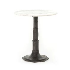 a white marble top table with black metal base