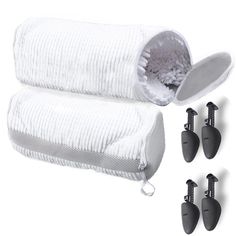 three white towels and four black hooks on a white background with the same item in front of them