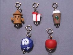 six different key chains with various items on them