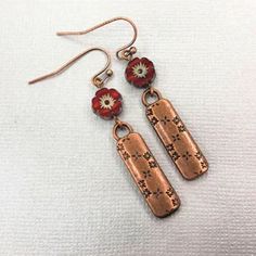 Vintage Red Copper Earrings, Red Hypoallergenic Flower Earrings For Gift, Red Drop Earrings With Flower Charm, Hypoallergenic Red Flower Earrings, Red Nickel Free Drop Flower Earrings, Red Nickel-free Drop Flower Earrings, Red Copper Drop Earrings, Nickel-free Red Copper Earrings, Red Dangle Earrings With Flower Charm