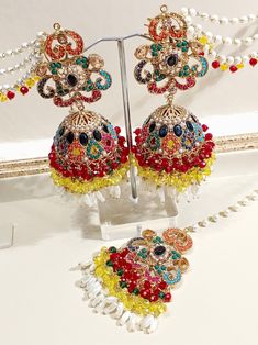 Nauratan Multi Stones Earrings Tikka Set Bohemian Multicolor Festive Tikka, Festive Multicolor Kundan Tikka, Traditional Multicolor Festive Tikka, Multicolor Festive Tikka, Multicolor Temple Jewelry Tikka, Pakistani Jewelry, Pakistani Wedding, Multi Stone, Stone Earrings