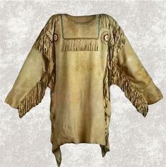 an old blouse with fringes and buttons on it