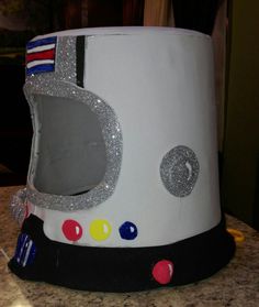 this is an image of a space helmet made out of paper mache and glitter