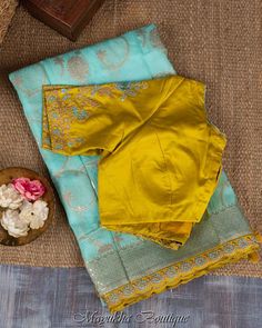 This Banarasi Blue Saree Is A Must-Have To Display The Most Opulent Apparel Style Of A Fashionable Persona. The Drape Has An Elegance That Never Goes Out Of Style Thanks To The Blue Base'S Shimmering Gold Zari Floral Jaal Tucked Into A Self Brocade Border, Which Is Bordered By A Yellow Scallop Embroidered Edge And Self Brocade Pallu. The Saree Is Paired With A Matching Yellow Blouse That Has Blue Piping Around The Neckline And Embroidery Hands. Features:Pure Dola Silk With Banarasi Jaal Work And Sky Blue Saree Contrast Blouse Silk, Blue Saree With Yellow Blouse, Gold Dola Silk Blouse With Dupatta, Designer Pista Green Blouse With Dupatta, Pista Green Chanderi Blouse With Dupatta, Designer Tussar Silk Blouse With Dupatta, Unstitched Tissue Silk Blouse Piece In Pista Green, Eid Tissue Silk Blouse With Zari Weaving, Festive Tussar Silk Blouse With Dupatta