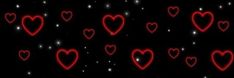 many red hearts are glowing in the dark