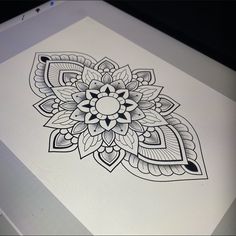 a black and white drawing of a flower