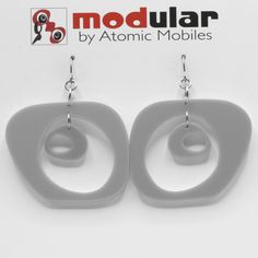 "Modern art earrings inspired by mid century modern retro design and my hanging art mobiles. Wearable art! Custom handmade by me in my studio in Los Angeles. No-worry, no-pain hypo-allergenic titanium ear wire, stainless steel rings, and adorably mod acrylic dangle shapes. Show your mid century modern style with these modern earrings! Arrives in lovely gift box with ribbon and includes free 2020 Atomic Mobiles Art Catalog. CHOOSE FROM 2 SIZES: Medium: 2 1/2\"h x 1 7/8\" w Small: 1 3/4\"h x 1 1/2 Modern Handmade Earrings, Mobiles Art, Modern Retro Design, Earrings Dangling, Acrylic Jewelry, Mobile Art, Kinetic Art, Art Earrings, Acrylic Jewellery