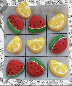 the cookies are decorated with different fruits