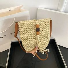 Women Handmade Straw Woven Small Bucket Bag Fashion Crossbody Shoulder Bag Ladies Simple Design Handbag Summer Travel Beach Bag SPECIFICATIONS Handbags Type: Shoulder Bags Types of bags: SHOULDER BAGS Main Material: Polyester Lining Material: Linen Shape: Casual Tote Gender: WOMEN Style: Casual Number of Handles/Straps: two hardness: Moderately soft material quality: Grass weaving Luggage shape: Vertical square shape Opening mode: zipper [New Arrival 20240524] Trendy Beige Straw Bag With Mobile Phone Bag, Trendy Beige Pouch Straw Bag, Trendy Natural Shoulder Bag With Mobile Phone Holder, Large Capacity Summer Fashion Bag, Summer Tote Bag Fashion Accessory, Casual Handheld Shoulder Bag, Summer Pouch Bags, Casual Handheld Bag, Summer Fashion Pouch Bag