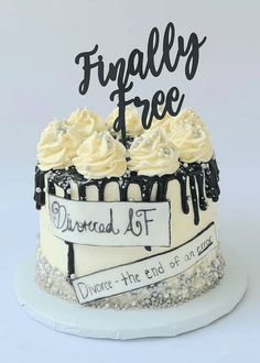 a cake with frosting and icing that says finally free