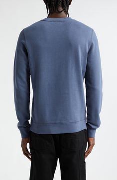 Classic and comfortable, this sweatshirt cut from cotton French terry makes a great layer and promises to age with you like a well-loved old friend. 27 1/2" length (size Medium) Crewneck Banded cuffs and hem 100% cotton Machine wash, dry flat Made in Portugal Designer Clothing Washed Blue Sweatshirt With Ribbed Cuffs, Sporty Washed Blue Sweatshirt With Relaxed Fit, Cotton Sweatshirt With Ribbed Cuffs In Washed Blue, Blue Crew Sweatshirt For Layering, Cotton Sweatshirt For Layering, Blue Washed Crew Sweatshirt, Washed Blue Crew Neck Sweatshirt Soft-washed, Washed Blue Crew Neck Sweatshirt For Fall, Blue Washed Cotton Sweatshirt