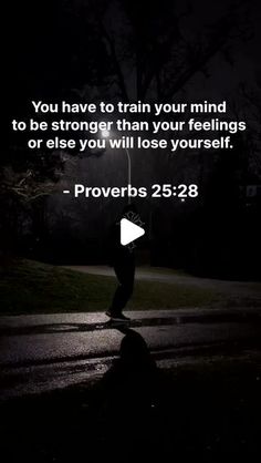 a person standing in the middle of a road at night with a quote from proverbs