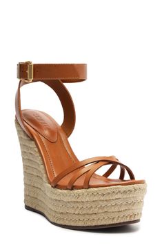 A gleaming buckle and rich leather upper lend luxe elements to an espadrille-inspired sandal lifted by a jute-wrapped platform and wedge heel. 5" heel; 2" platform (size 8.5) Leather upper and lining/synthetic sole Made in Brazil Espadrilles Platform, Rollerball Perfume, Flip Flop Slippers, Platform Wedge Sandals, Platform Wedge, Heeled Loafers, Wedge Sandal, Sandal Women, Platform Wedges