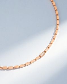 Crafted with solid 18-karat gold, this block-chain necklace presents a symphony of four-sided links. It features a single link set with pave white diamonds on all four sides. The thick, block-chains add a contemporary edge to the timeless design making it perfect for casual or evening wear. Details 18k yellow gold, rose gold or white gold 0.50 carats of pave white diamonds 18" inch is adjustable at 15 and 16" inches 24" inch is adjustable at 22" inches, standard length for men Model is styling 1 Thick Necklace, Men Model, White Rose Gold, Pave Diamonds, Evening Wear, Diamond White, Timeless Design, Necklace Lengths, Chain Necklace