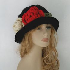 I love making unique hats. Everytime I make this hat feel like creating a painting. Not just a hat it's an art. This hat is black with red and cream flowers and green leaves. Please make sure choose the correct size if you want it fit perfect. If you are interested in an item but would prefer a different size or color feel free to contact us and we'll try to make it for you. I can make the flowers almost any colors in my store upon request. Always smoke, pet free home. Handmade Adjustable Bonnet With Short Brim, Handmade Adjustable Short Brim Bonnet, Handmade Mini Hat With Short Brim, Handmade Mini Hats With Short Brim For Gifts, Handmade Mini Hat With Short Brim As Gift, Handmade Mini Hat With Short Brim For Gift, Handmade Brimmed Bonnet, Handmade Vintage Cloche Hat, Artistic Wide Brim Hat, One Size