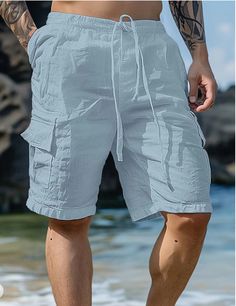 The Plain Multi Pockets Linen Knee Length Shorts offer a blend of functionality and comfort with multiple pockets and breathable linen fabric. Ideal for warm weather, these knee-length shorts provide a relaxed fit perfect for casual outings. Pair them with a simple T-shirt or polo for a laid-back, stylish look. Beach Dresses Casual, Casual Dresses Plus Size, Pale Turquoise, Knee Length Shorts, Five Points, Wedding Dresses Plus Size, Beach Shorts, Linen Shorts, Plus Size Swimwear