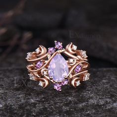 Item description ✦ Handmade, high-quality item! ✦ Material: 925 sterling silver, Solid 10k/14K/18K GOLD (can be made in white/rose/yellow gold) Engagement ring ✦ Center stone: Natural Lavender Amethyst. ✦ Size/Weight: 6x8mm Pear Cut ✦ Side stones: Marquise Cut Natural Amethyst and Round Cut Moissanites. Wedding band ✦ Gemstones: Natural Amethyst and Moissanites. Any ring size can be made,if the ring size is not in the option list ,contact me. As it is handmade,it needs 2-4 weeks to finish and th Fairycore Accessories, Purple Engagement Ring, Amethyst Engagement Ring, Amethyst Wedding, Unique Engagement Ring Settings, Lavender Amethyst, Amethyst Ring Engagement, Cute Engagement Rings, Moon Ring