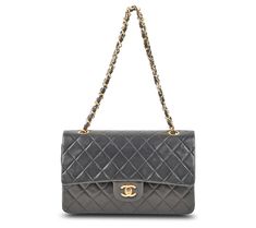 Indulge in the timeless elegance of the pre-owned Chanel Classic Double Flap shoulder bag, crafted from luxurious lambskin in a sophisticated black, complemented by striking goldtone hardware. This exquisite piece features a double strap and an organized interior with two slip pockets, ensuring your essentials are neatly stored. From Chanel. Classic Pre-owned Shoulder Bag, Classic Rectangular Pre-owned Shoulder Bag, Pre-owned Classic Business Shoulder Bag, Classic Pre-owned Business Shoulder Bag, Pre-owned Business Bags, Adaptive Clothing, Beauty Storage, Koolaburra By Ugg, Flap Shoulder Bag