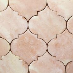 a close up view of a tile pattern