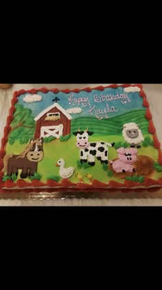 a birthday cake with farm animals on it