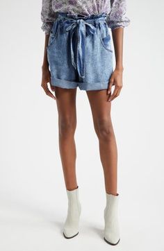 Flow and flounce define denim shorts topped by a tied paperbag waist and cut from cool lyocell. 2 1/2" inseam; 27" leg opening; 14" front rise; 15 1/2" back rise (size 40fr) Zip fly with button closure Five-pocket style Removable sash Cotton lining 100% lyocell Dry clean Imported Balloon Leg Jeans, Sailor Shorts, Orange Fits, Summer Wardrobe Essentials, Upcycle Jeans, Blue Fits, Sports Blazer, Made Clothing, Comfortable Dress