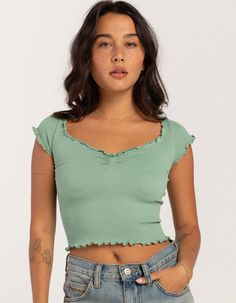 Bdg Urban Outfitters Elise Cap Sleeve Knit Top. Rib Knit Construction. Cinched Detailing At Center Chest. V-Neckline. Cap Short Sleeves. Lettuce Edge Trim. Fitted Silhouette. Cropped Length. 94% Polyamide, 6% Elastane. Machine Wash. Imported.model Is Wearing A Size Small. Model Measurements:height: 5'7" Bust: 34"waist: 25"hips: 34.5" Cheap Urban Outfitters Cotton Crop Top, Green Ribbed V-neck Crop Top, Trendy Knit V-neck Crop Top, Casual Seamless Knit Tops, Casual V-neck Knit Crop Top, Casual Knit Cropped Top, Casual Knit V-neck Crop Top, Seamless Casual Tops For Fall, Casual Stretch Knit Crop Top