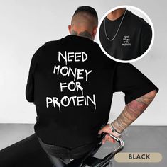 Show off your sense of humor with this "Need Money for Protein" gym t-shirt. Designed for fitness lovers, weightlifters, and gym enthusiasts, this shirt is perfect for workouts, gym sessions, or as a fun casual wear option. Makes a great gift for the gym rat in your life! - - RETURNS - - (please read) 🔻 All sales are final! Since all items are custom printed for you - returns and exchanges are NOT accepted. Please reach out if you have any issues with your order. --FIT-- SIZE UP for an OVERSIZE Gym T Shirt Design, Gym Rat Gift, Workouts Gym, Funny Workout Shirts, Gym Tees, Funny Workout, Need Money, Fitness Studio, Workout Humor