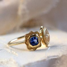 Presenting 'Bijou d'Art Etoile,' a piece where vintage allure meets artistic craftsmanship in the Impasto Collection. This size 6, 14K yellow gold fashion ring features a regal 0.33Ct princess-cut sapphire paired with a brilliant round G/H Vs1 diamond, creating a celestial harmony of gemstones. Vs1 Diamond, Princess Ring, Vintage Princess, Gold Rings Fashion, Fashion Ring, G H, Jewelry Branding, The Golden, Fashion Rings