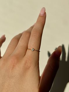 🖊️ Product details 🖊️ Gold waterproof ring, stainless steel material with clear CZ round stone on twisted band. AAA Grade CZ.  Weight 0.41g. Sizing: Size 7 ~ 17.3mm Check out our other waterproof jewellery here: https://www.etsy.com/au/shop/CatAndMogi?ref=seller-platform-mcnav§ion_id=40329032 💌 Care 💌 Our gold rings are waterproof and won't tarnish! They will not rust or turn your fingers green when in contact with water or sweat, hooray! 💛 Thank you for choosing our store, we hope you love your goodies as much as we do!💛 Minimalist Vvs Clarity Birthstone Ring, Cubic Zirconia Diamond Ring Gift, Cubic Zirconia Diamond Ring, Tarnish Resistant, Gift, Dainty Tarnish Resistant Crystal Promise Ring, Minimalist Tarnish Resistant Diamond Ring, Tarnish Resistant Cubic Zirconia Crystal Ring For Promise, Tarnish Resistant Cubic Zirconia Promise Ring, Crystal Ring With Single Diamond As Gift, Tarnish Resistant Cubic Zirconia Crystal Promise Ring