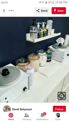 there are many items on the shelf in this bathroom counter top, including soaps and lotion