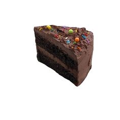 a slice of chocolate cake with sprinkles and candies