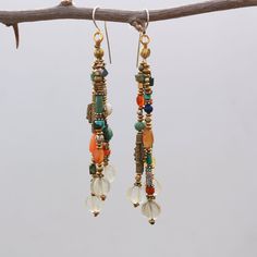 Vintage Dangle Beaded Earrings For Festival, Eclectic Beaded Dangle Jewelry, Vintage Turquoise Earrings With Dangling Beads, Bohemian Beaded Dangle Earrings With Natural Stones, Bohemian Dangle Beaded Earrings With Natural Stones, Artisan Natural Stone Dangle Beaded Earrings, Artisan Natural Stone Beaded Dangle Earrings, Vintage Multicolor Beaded Earrings With Ear Wire, Artisan Dangle Beaded Earrings With Natural Stones