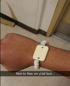 an arm with a medical device attached to it's wrist that says not to flex on y'all but