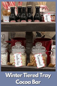 a shelf filled with bottles and candy canes next to other items on top of it