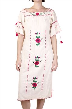 A cream cotton maxi day dress, is hand-embroidered with pink flowers and exposed stitching, and tasseled trumpet sleeves. Wear this dress everyday, to the farmers market, running errands, or out to lunch. This perfect summer vintage Mexican dress is light weight, and in fabulous condition. Product Measurements: See the Measurement Guide in the photo carousel. Shoulder: 19" Chest: 40" Waist: 28" - 32" Bum: 42" Sleeve Length: 10.5 Entire Length: 46" Condition: AB See the Condition Grade Scale on t Spring Festival Peasant Dress, Traditional Beige Embroidered Summer Dress, Traditional Beige Embroidered Spring Dress, Traditional Cream Embroidered Dress For Spring, Traditional Beige Embroidered Dress For Spring, White Cotton Peasant Dress For Spring, Cream Folk Dress For Spring, Folk Style Cream Dress For Spring, Spring Folk Cream Dress