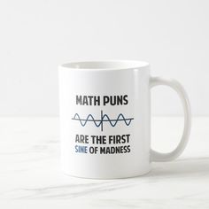 a coffee mug that says math puns are the first sine of madness