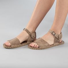 Step out in style and comfort with our Tan Opened Toe Barefoot Sandals! Handmade with 100% natural leather, these sandals feature a natural leather upper and lining, and a water buffalo leather sole that's perfect for all-day wear. The "zero-drop" non-elevated heel ensures proper posture while the wide toe boxes give your toes enough room to spread and relax. To ensure the perfect fit, use our easy-to-follow size chart and measure your foot to find the right size. With next day shipping and free shipping to the USA, Canada, and Europe, you can have your Tan Opened Toe Barefoot Sandals in no time. Plus, with our easy exchange and return policy, you can shop with confidence. Made in Turkey 100% Handmade 100% Natural Hand-Stitched Natural Leather Upper Natural Leather Lining Water Buffalo Lea Comfortable Open Toe T-strap Sandals With Leather Footbed, Comfortable T-strap Leather Footbed Sandals, Comfortable Sandals With Leather Footbed And Open Heel, Comfortable Leather Footbed Sandals With Open Heel, Casual Suede Slingback Sandals With Leather Footbed, Suede Sandals With Rubber Sole And Open Toe, Casual Footbed Sandals With Ankle Strap And Leather Sole, Suede Sandals With Rubber Sole For Summer, Vacation Open Toe Sandals With Stitched Sole