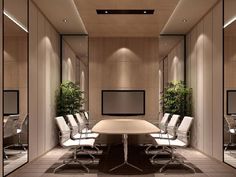 an empty conference room with white chairs and a flat screen tv mounted to the wall