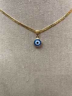 "This is a beautiful evil eye necklace that is 18k gold filled. Beautiful for every day wear and as a gift. Ajustable 16\" to 18\" long. The necklace 20\" is available The necklace is available in 22\" is more Thicker All of our jewels are covered with 7 layers of 18k Ecuadorian gold. *tarnish resistant and hypoallergenic *please message me if you have any questions :)" Gold Necklace Evil Eye, Every Day Rings, Evil Eye Gold Necklace, Evil Eye Necklaces, Everyday Yellow Gold Evil Eye Charm Necklaces, Gold Plated Evil Eye Jewelry For Everyday, Everyday Evil Eye Gold Plated Jewelry, Everyday Gold Plated Evil Eye Jewelry, 14k Gold Filled Evil Eye Jewelry