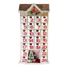 a wooden calendar with numbers on it and a christmas tree in the middle is shown