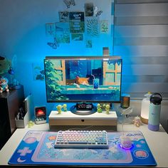 a computer desk with a keyboard, mouse and monitor sitting on it's side