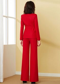 Stay warm in style with this red two-piece suit for women. Crafted from a wool blend, this sophisticated outfit features a belted jacket and wide-leg pants, creating an elegant, timeless look. Perfect for any special occasion. Jacket: Long sleeves Stand Up Collar Removable belt Front pockets 40% Wool, 60%polyester, Machine wash, tumble dry Pants: Zip fly with hook-and-bar closure Front slant pockets 40% Wool, 60% Polyester Machine wash, line dry Women's Clothing Item #1138 SIZE INFO XS=US2=UK6=E Red Long Sleeve Pantsuit For Business, Red Long Sleeve Business Pantsuit, Red Winter Suits For Workwear, Red Fall Office Suit, Elegant Red Workwear Sets, Elegant Red Sets For Workwear, Elegant Red Sets For Work, Elegant Red Sets For Fall, Red Notch Lapel Pantsuit For Fall