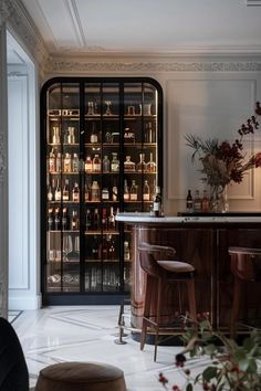 5 Home Bar Design Ideas for a Chic Look Residential Bar Design Modern, Library Bar Home, Rounded Bar Counter, At Home Speakeasy Bar, Dark And Moody Home Bar, At Home Bar Room, Bar Seating Design, Open Shelf Bar Ideas, Led Lights Bar Interior Design