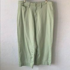 A New Day women’s wide leg crop pants - mint green size: 14 Crop high-rise, stretch material, relaxed hip and thigh. Brand new with tags, never worn. Zipper/button fly both intact and functional. No discoloration, fading, stains, rips or holes. Smoke free home. This listing is for the Mint Green Pants Spring Casual Light Green Bottoms, Green Relaxed Fit Cropped Bottoms, Spring Green Cotton Capris, Green Cropped Leg Bottoms, High Waist Green Capris For Summer, High-waist Green Capris For Summer, Green Straight Leg Capris With Pockets, Green Cropped Leg Bottoms For Work, High Waist Green Capris For Spring