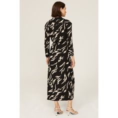 Black abstract print crepe (100% Polyester). Wrap. Long sleeves. V-neck. Tie closure. 49.5" shoulder to hemline. Imported. Printed Wrap Dresses, Rent The Runway, Closet Designs, White Boots, Black Abstract, Abstract Print, Neck Tie, Wrap Dress, Long Sleeves