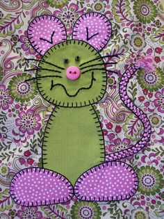 a close up of a cat on a colorful background with flowers and circles around it