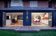 an open patio with sliding doors leading into the living room