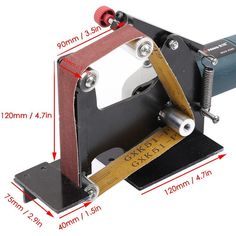 a close up of a machine with measurements for the handle and blades on it's side