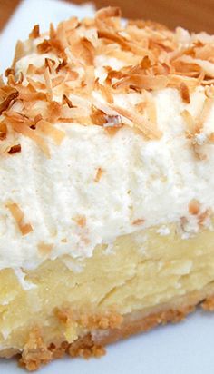 a piece of coconut cream pie on a white plate